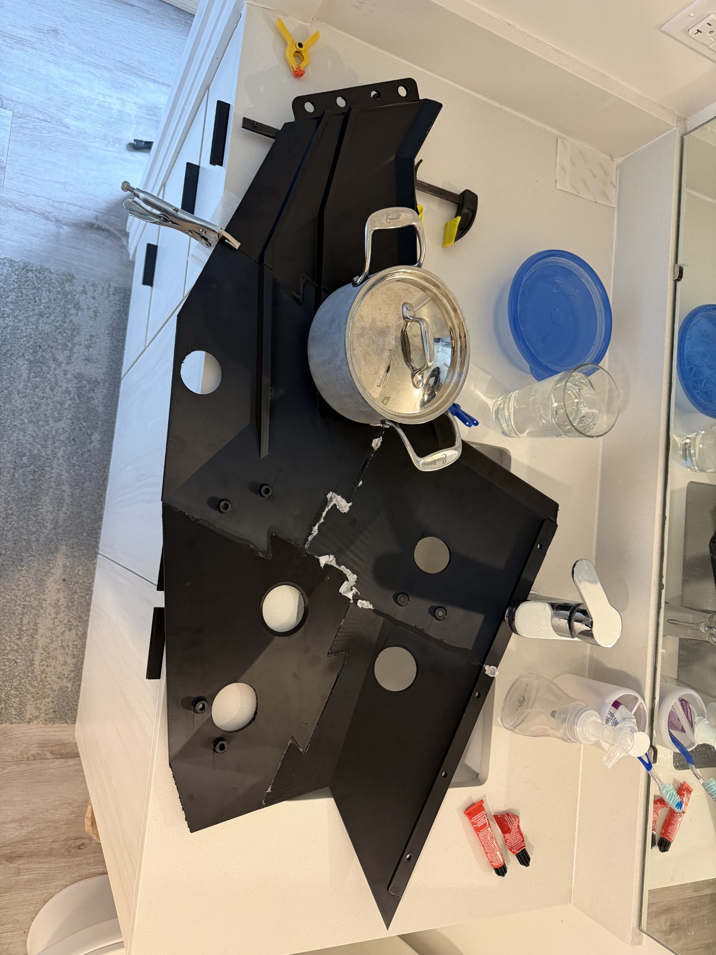 Side fairing weighted down with water while curing