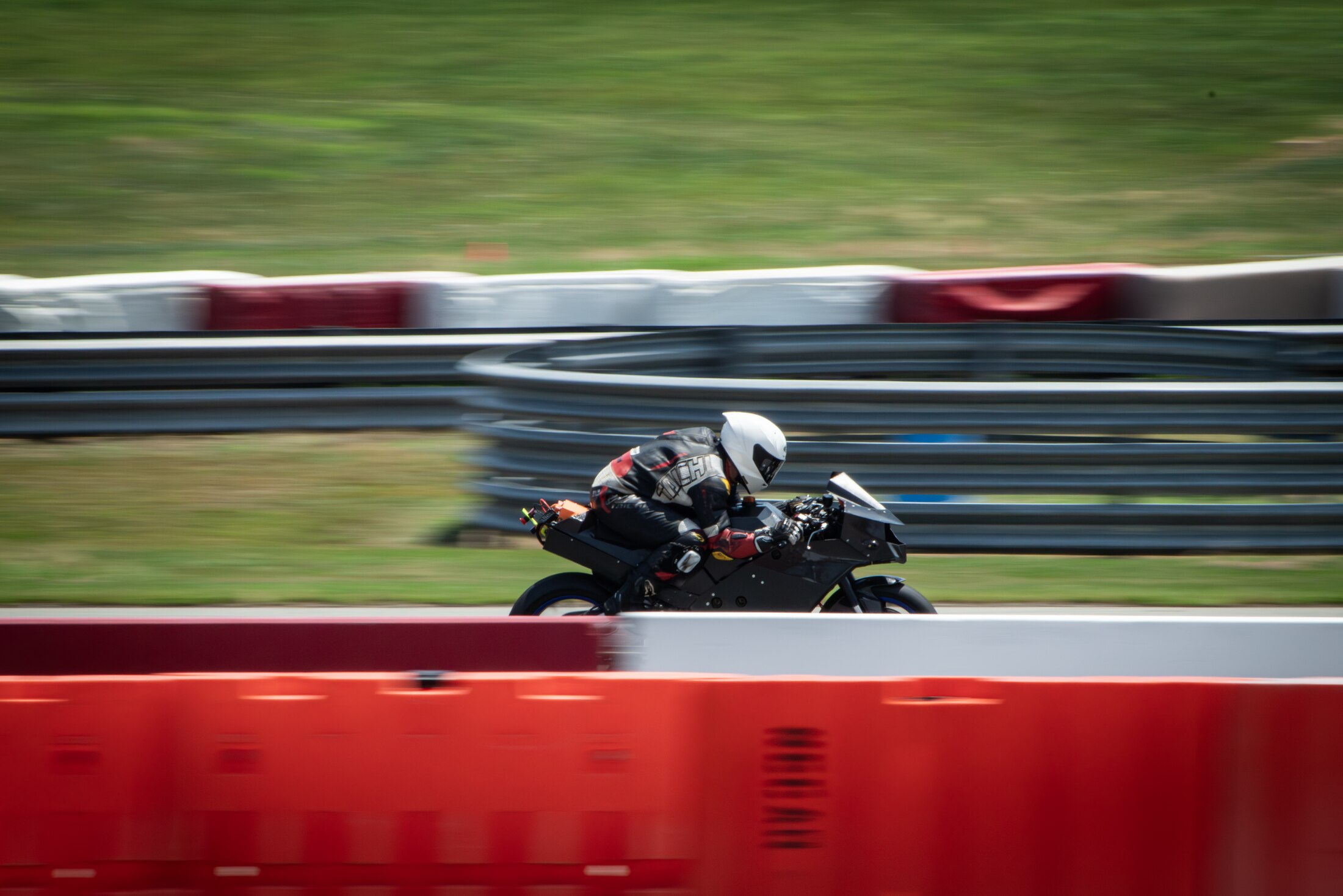 BOLT VI electric motorcycle at speed on track