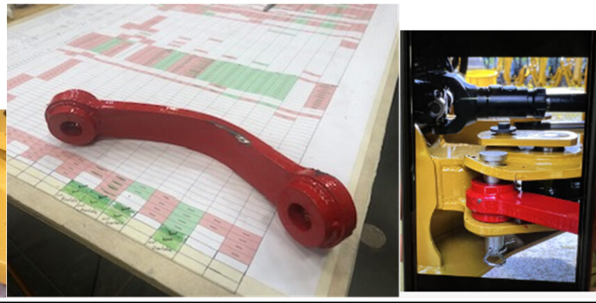 The steering lockout link &mdash; isolated part and installed on machine