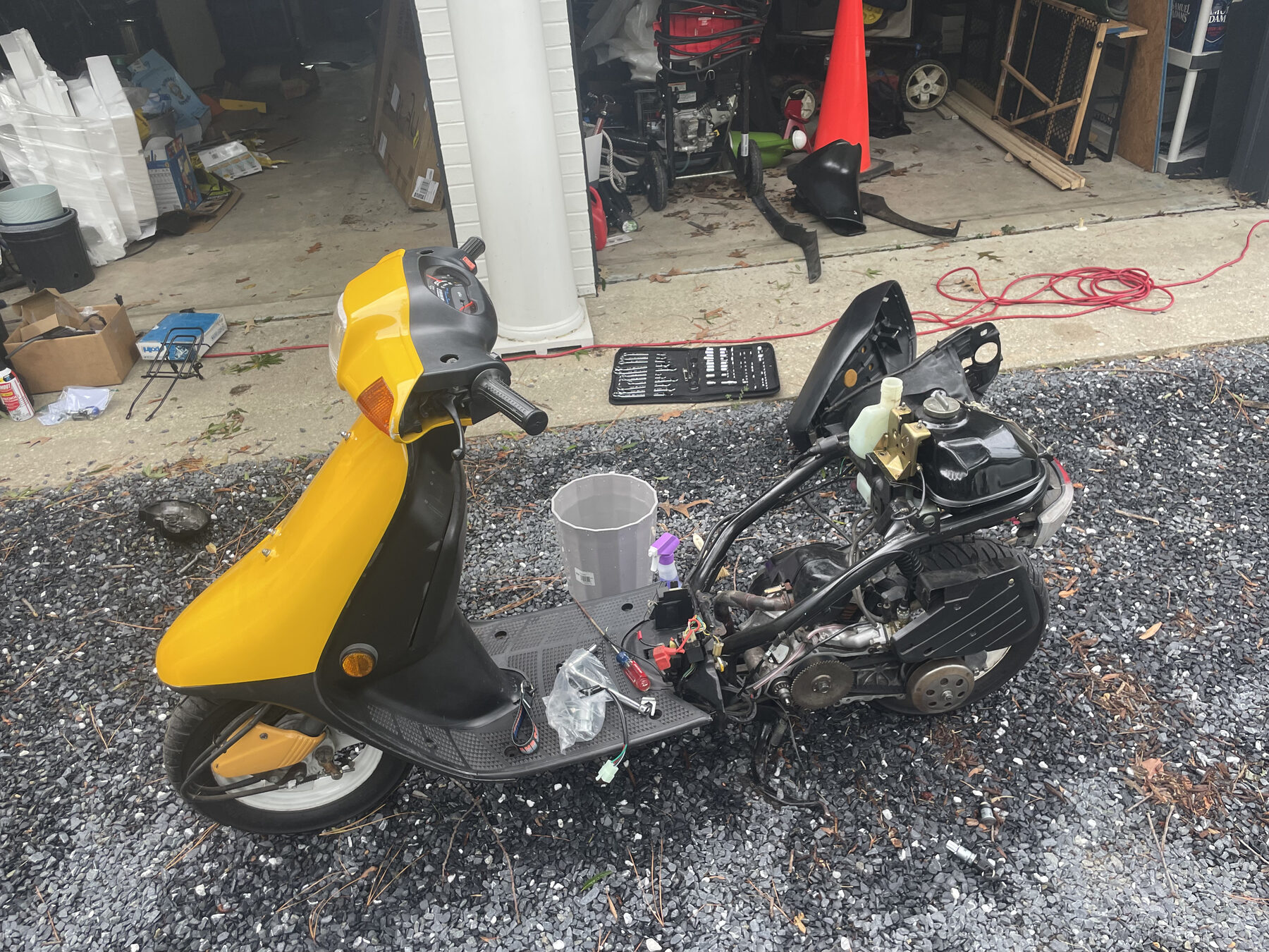 Wrenching on the moped